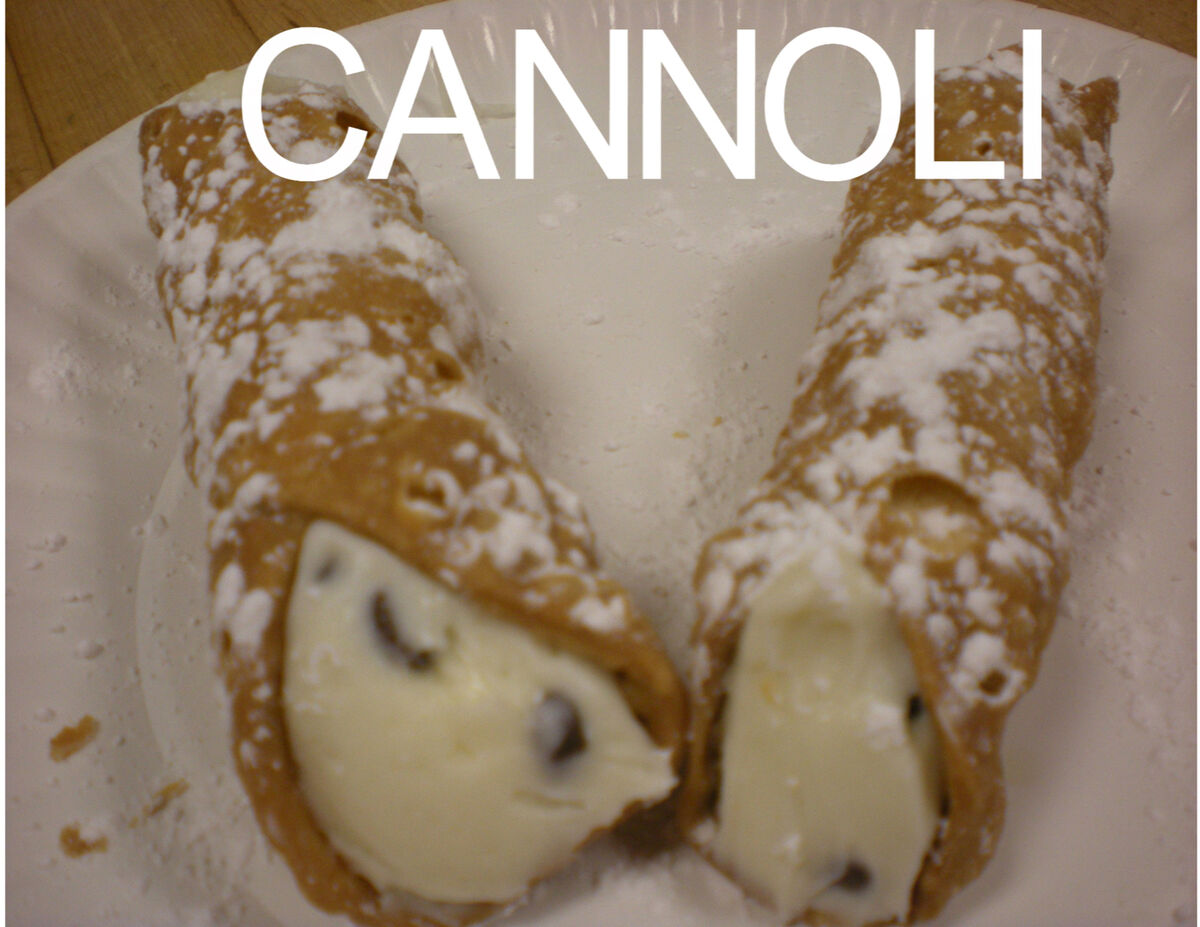 Fresh cannoli closeup with ricotta filling and chocolate chips