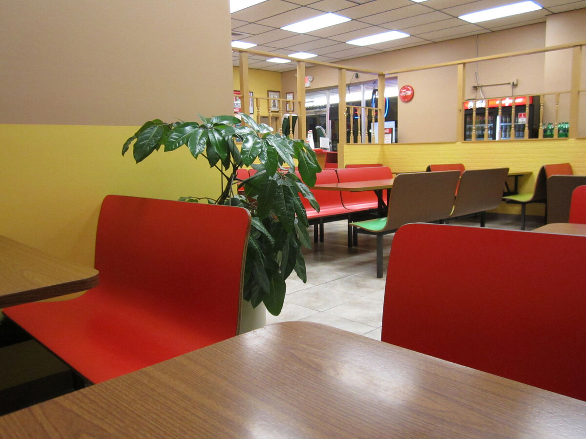 Cozy dining area with booth seating at Schianos Las Vegas Pizza eatery