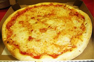 NYC-style cheese pizza slice closeup from Schianos Las Vegas Pizza